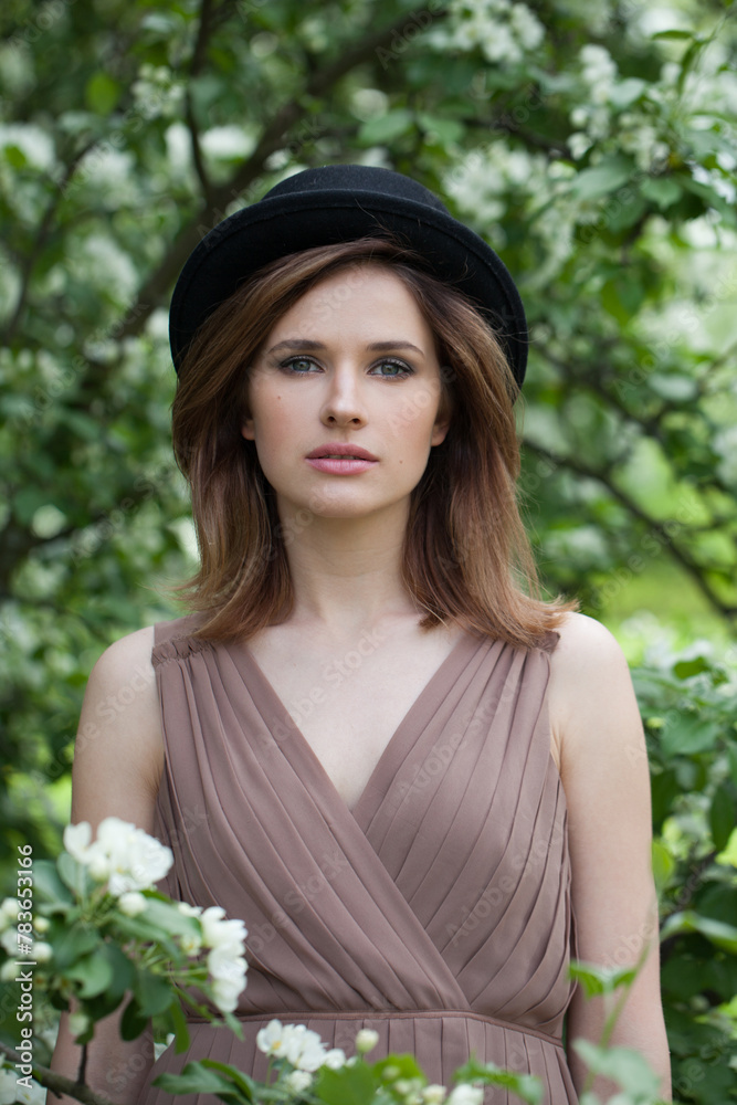 Young healthy woman posing outdoor in spring park, closeup portrait Young healthy woman posing outdoor in spring park, closeup portrait