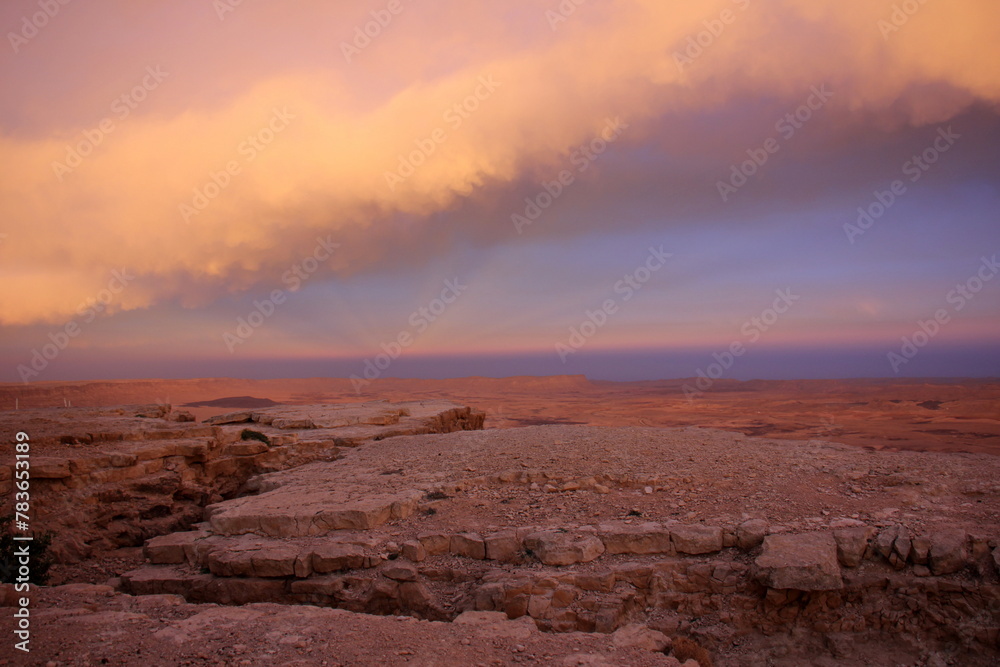 Lighting and color of the sky above the horizon at sunset.