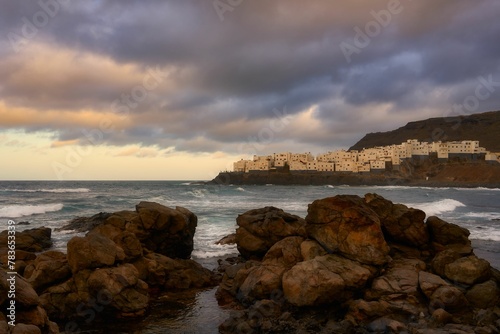 Scenic view of El Puertillo beach in Canary Island, Spain, in a sunset sky background