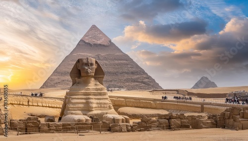 The Great Sphinx bythe Pyramids of Egypt and its companions in the sands of Giza desert, Egypt
