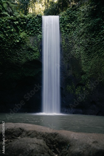 Vertical shot of a waterfall in Bali