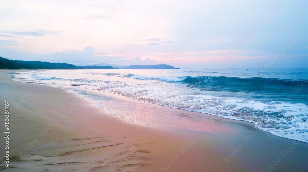 A serene beach at dawn, the sky painted in soft pastels, inviting a moment of peaceful reflection by the sea.