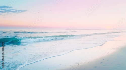 A serene beach at dawn  the sky painted in soft pastels  inviting a moment of peaceful reflection by the sea.