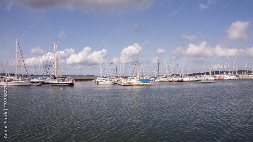 View of sailing boats moored at the marina