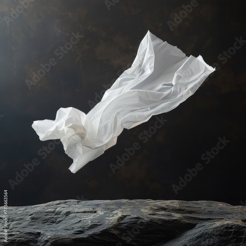 Flying white scarf on a dark background.