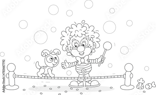 Funny circus clown playing with a his cheerful small puppy balancing on a taut rope in a fun performance, black and white vector cartoon illustration for a coloring book