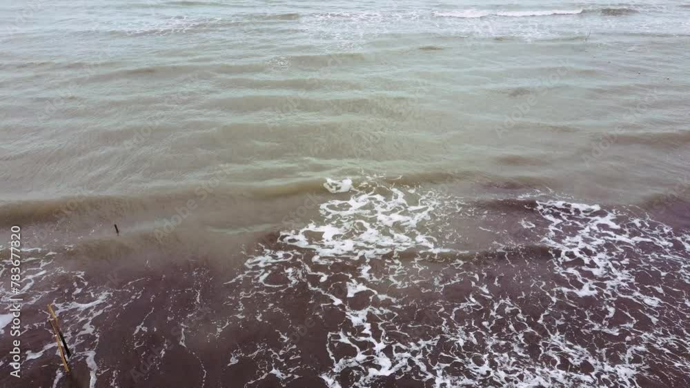 waves on the beach.The rough sea and calm coast with cool winds in the north of Iran waves on the beach.The rough sea and calm coast with cool winds in the north of Iran