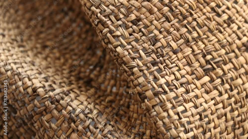 Straw old brown hat as background closeup Straw old brown hat as background closeup