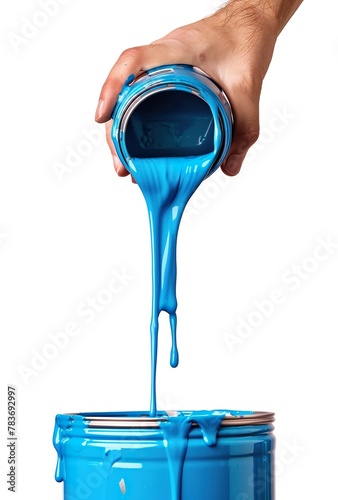hand hold can with blue paint and pouring on white background isolated, liquid dye falling