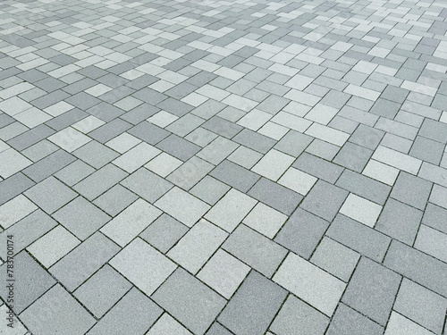 Outdoor floor material. gray paved road from concrete pavers
