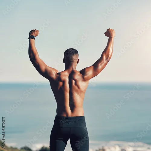 Obraz Outdoor, winner and athlete in nature, black man and mountain for workout, training and exercise for muscle. Active, energy and person in environment, sport and wellness for fitness and healthy body