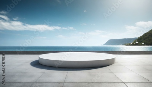 Sleek Waterside Display: Round White Podium on Concrete Floor © Behram