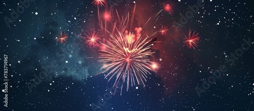 Colorful fireworks illuminating the night sky filled with stars and a light dusting of snow in the background