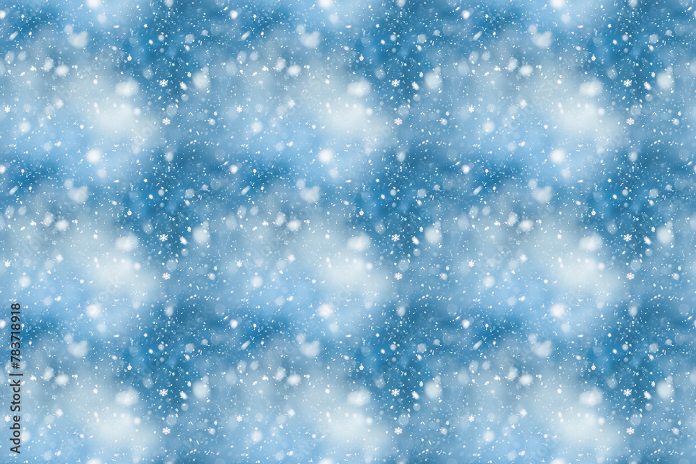 Falling snowflakes pattern on a dreamy blue background