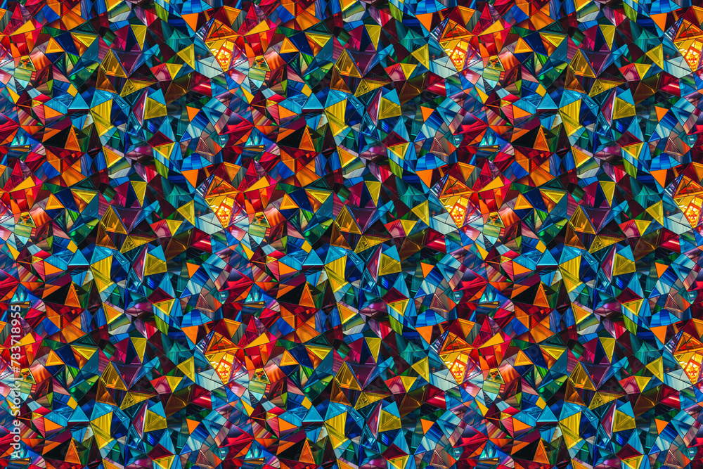 Kaleidoscopic geometric pattern with vibrant triangles Kaleidoscopic geometric pattern with vibrant triangles