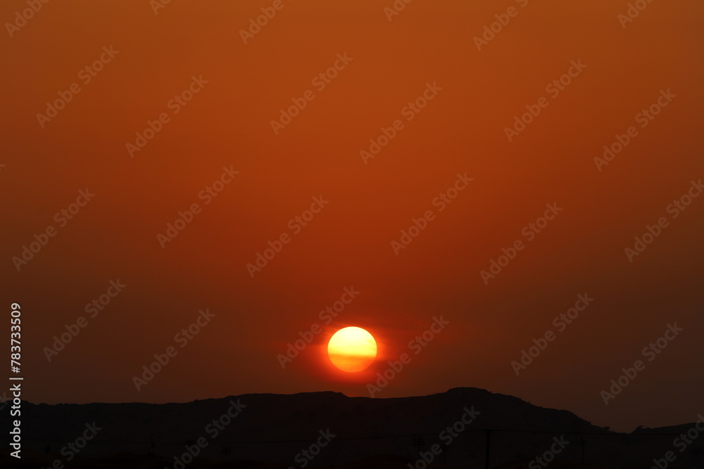 Lighting and color of the sky above the horizon at sunset. Lighting and color of the sky above the horizon at sunset.