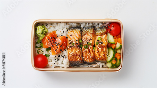 Bento box with rice, vegetables and salmon on a white background. Onigiri or broiled fish in a paper container isolated on a white background. A top view flat lay of Japanese food concept for a lunch.