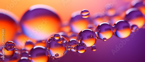 Vivid Orange and Purple Background with Floating Water Droplets