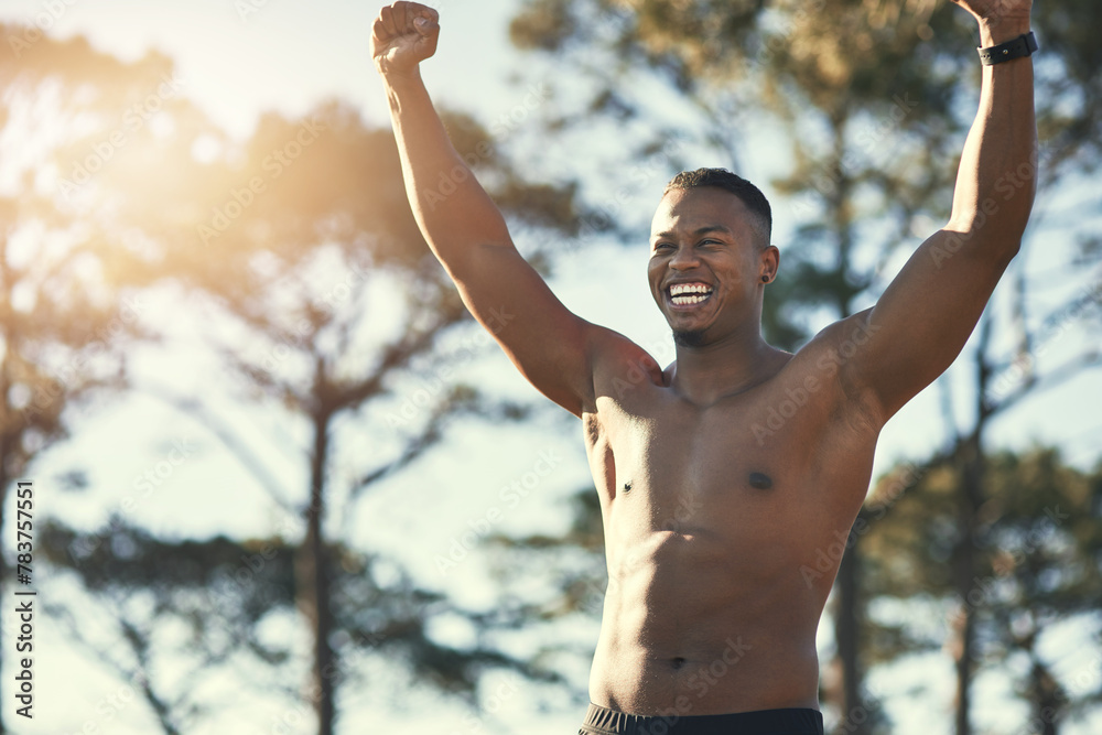 Victory, sports and forest for African man, athlete and nature for workout, training and exercise. Active, energy and person in environment, muscle and wellness for fitness and healthy body outdoor