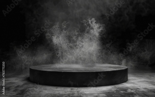 Gray textured concrete platform podium or table with smoke in the dark