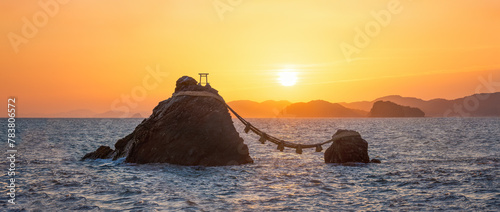 Sunrise at the sacred Meoto Iwa Rocks also known as the Wedded Rocks, Futami, Mie Prefecture, Japan photo