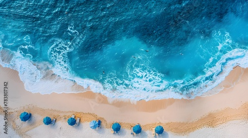 Half sand, half deep blue ocean, There are umbrellas and lounge chairs on the beach View. For Design, Background, Cover, Poster, Banner, PPT, KV design, Wallpaper, travel, vacation, island © horizor
