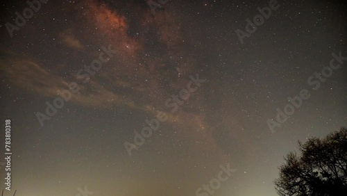 4K time lapse video of milky way galaxy movement along with stars and dust passing through Bangalore City India photo