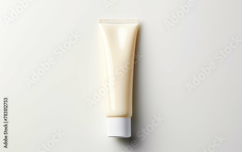 a tube of cream on a white background