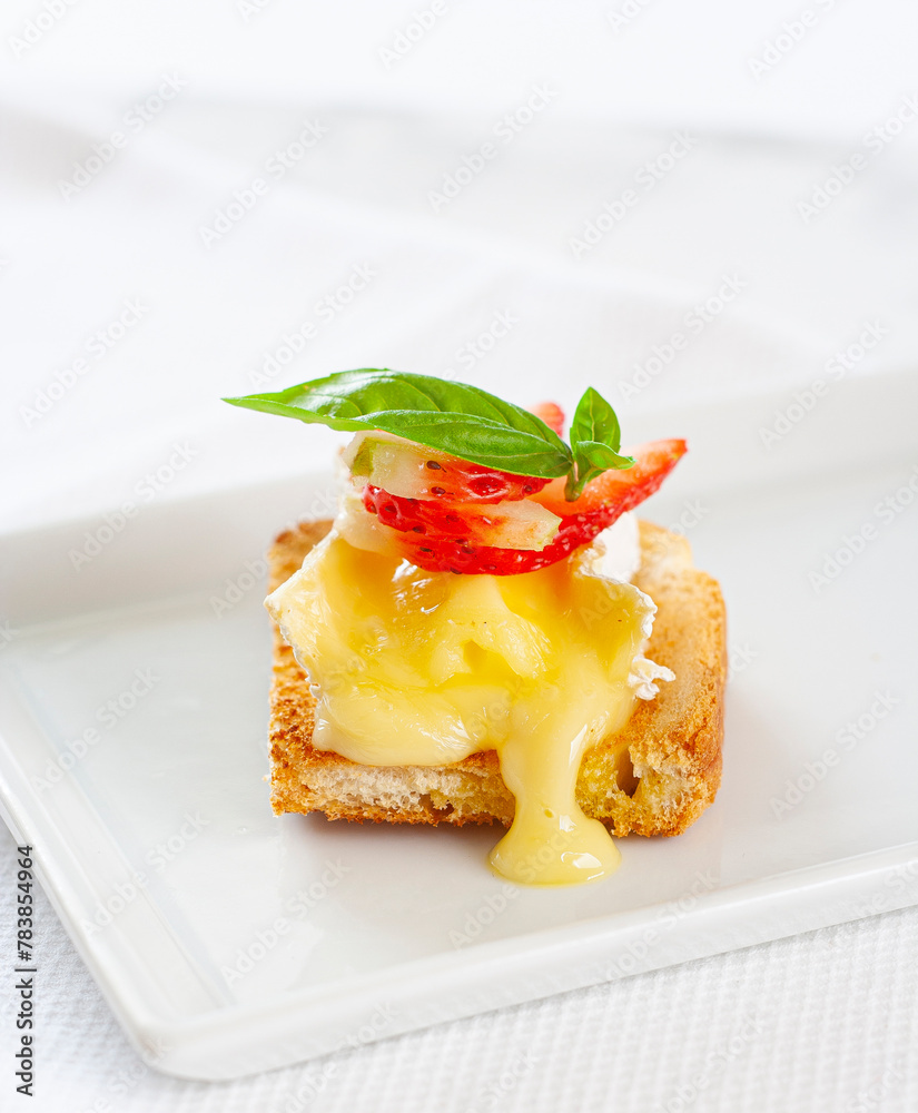 Delicious brie cheese skewer with strawberries and basil... Delicious brie cheese skewer with strawberries and basil...