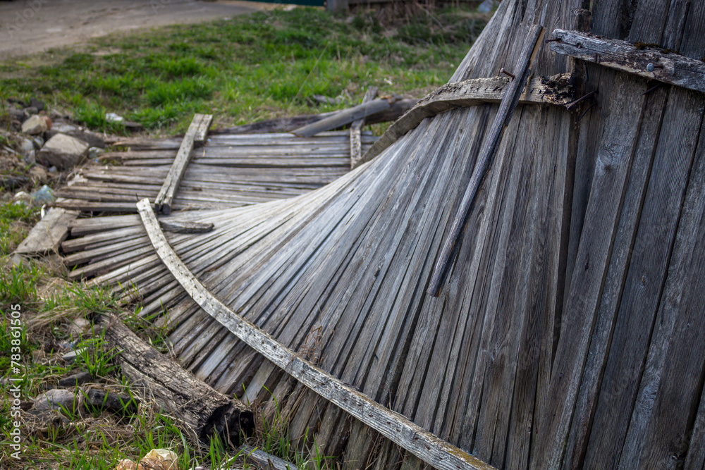 The fallen broken wooden fence, abstract view The fallen broken wooden fence, abstract view