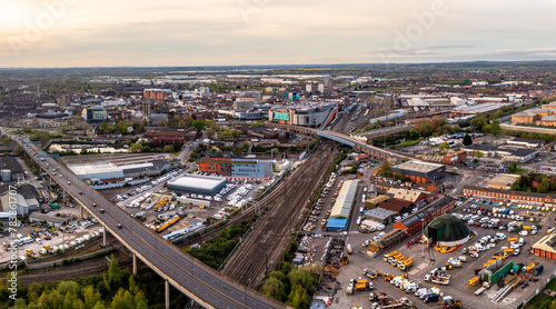 Aerial view of Doncaster city centre with transport links at sunset photo