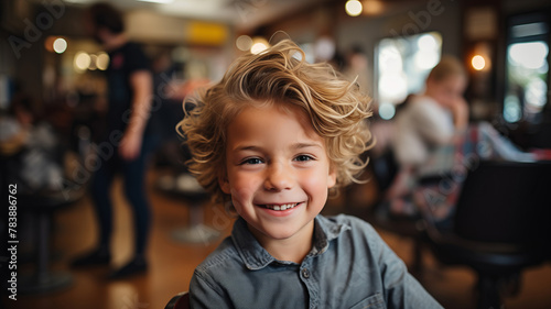 Happy hipster child boy in barbershop with fashion haircut, background barber shop