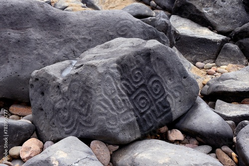 Carved stone on the beach at Las Labradas, Mexico