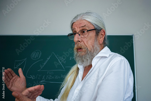 A passionate teacher explains the basics of photographic exposure to his students