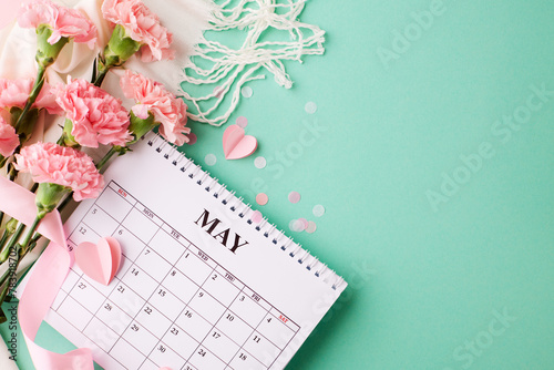 Mother's day schedule: bright calendar with pink carnations on a turquoise background, perfect for custom greetings