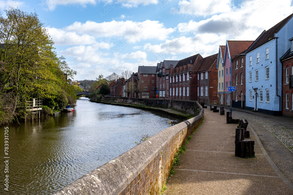 View down the Wensum River on a bright and sunny day