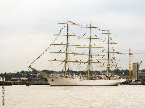 A large full rigged tall ship moored in the western part of the Thames river in the Greater London, UK photo