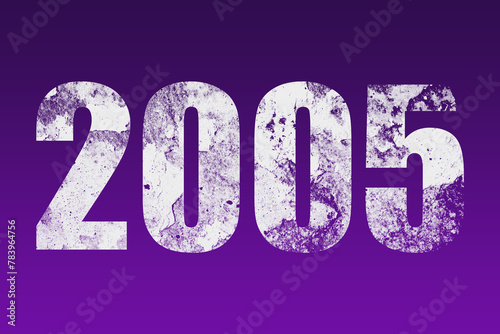 flat white grunge number of 2005 on purple background. photo