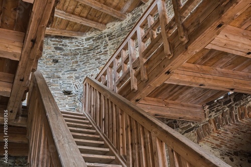 Wooden stairs in the old castle. Interior of medieval castle.