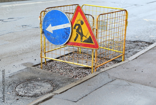 Signs of road works and mandatory detour