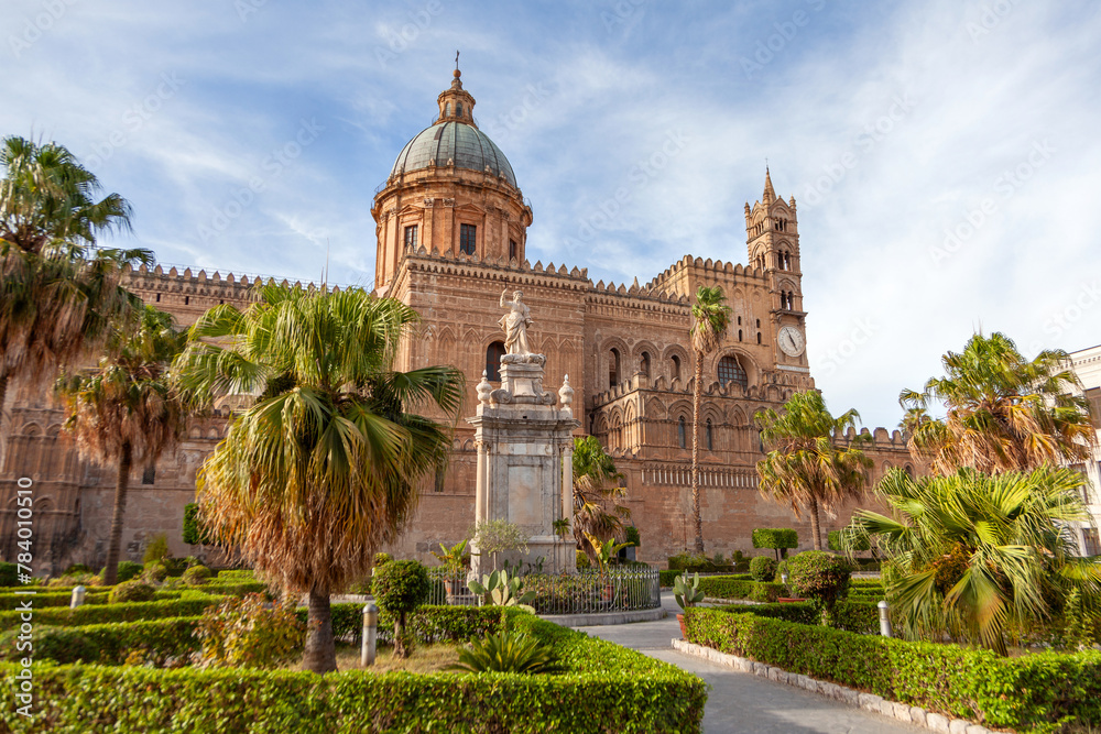 Palermo Cathedral under a clear sky, with statue of Santa Rosalia in Palermo, Sicily, Italy