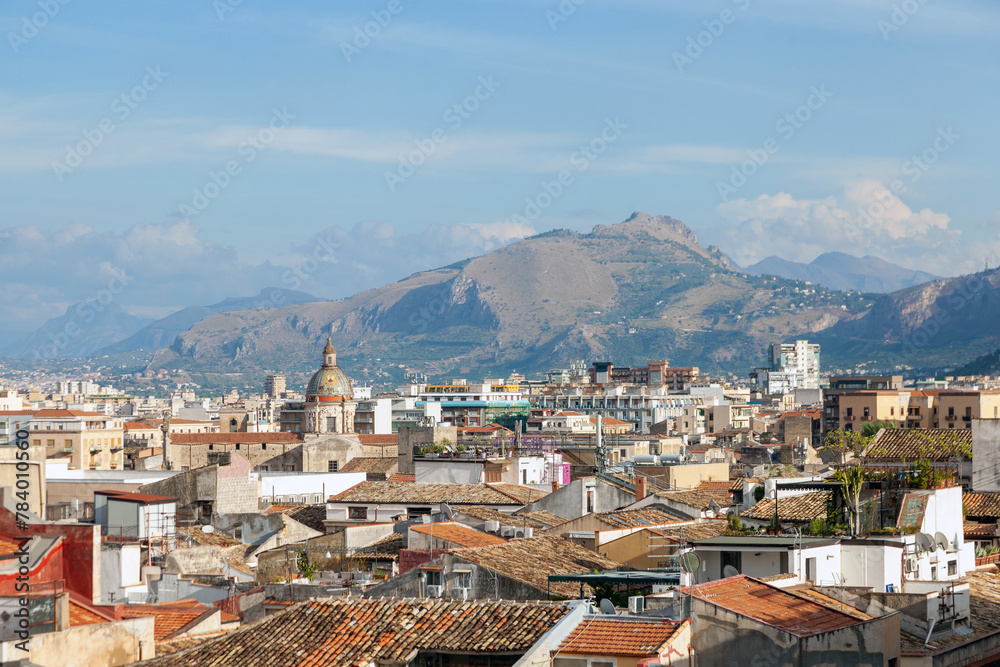 Palermo cityscape, Sicily, Italy. The vast urban landscape of Palermo unfolds under the watchful eye of the Sicilian mountains, a harmonious blend of nature and architecture
