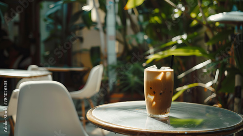 A glass of iced coffee in a quiet, tree-lined café (Generative AI)