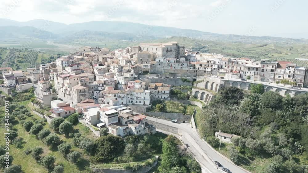 Aerial video over a small ancient town in Monasterace Italy Aerial video over a small ancient town in Monasterace Italy