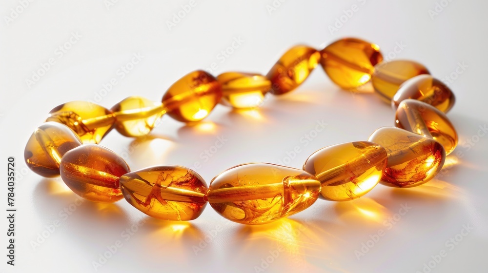 A detailed close up of a bracelet made of amber beads. Perfect for jewelry designers and retailers A detailed close up of a bracelet made of amber beads. Perfect for jewelry designers and retailers