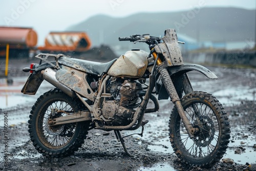 A dirty off road motorcycle after a wild ride. © Nicole