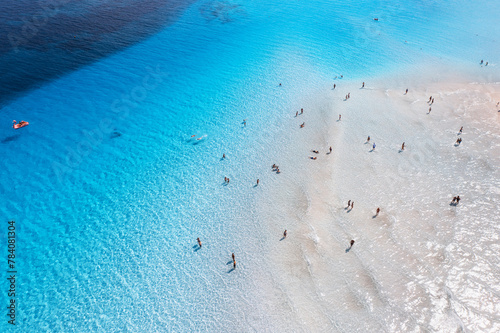 Aerial view of amazing sea coast. Top view of white sandy beach