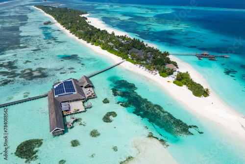 stunning blue ocean and sandy lux hotels on water top drone aeral view Maldives beach copyspace for text