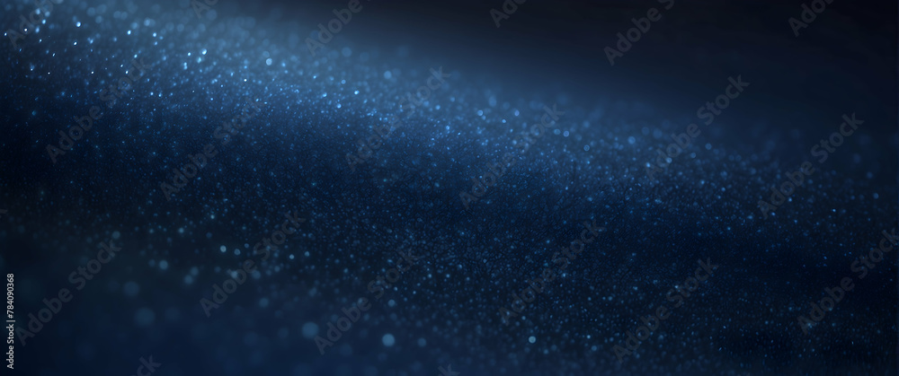 Fototapeta premium A mesmerizing dark blue night sky filled with celestial dust and twinkling stars evokes wonder and the cosmos