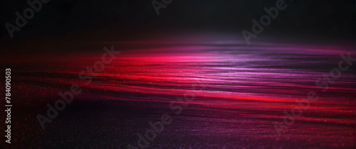 The dark, fluid background accentuates the luminous crimson waves, creating a sense of dynamic movement